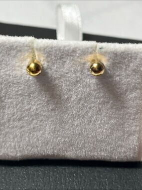 Simple polished gold-tone ball stud earrings
wide long posts newly pierced ears